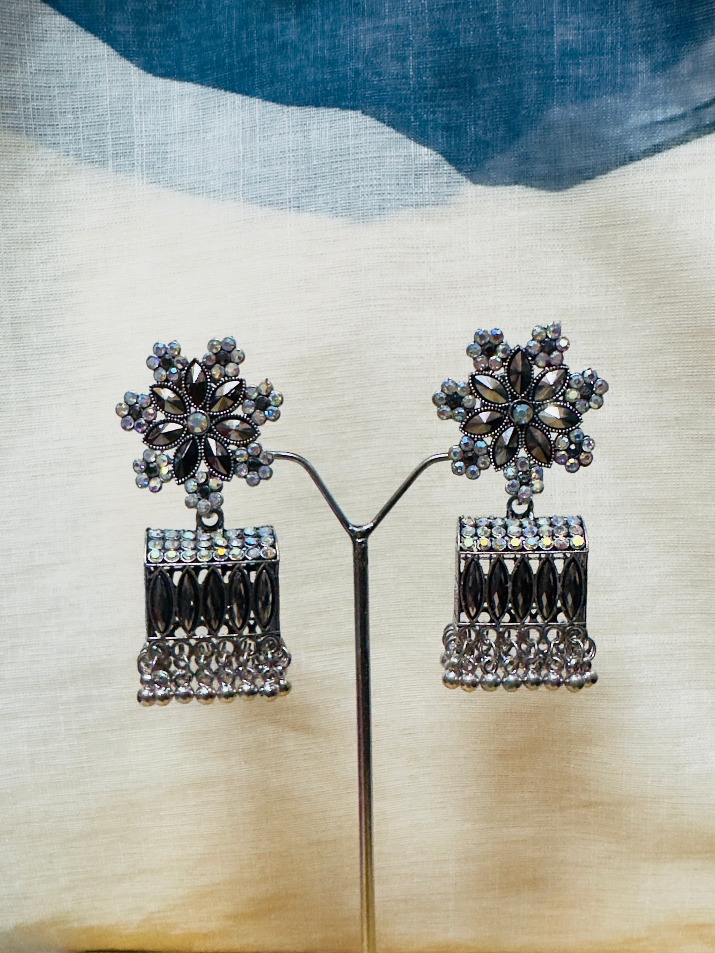 Jhumka style earnings