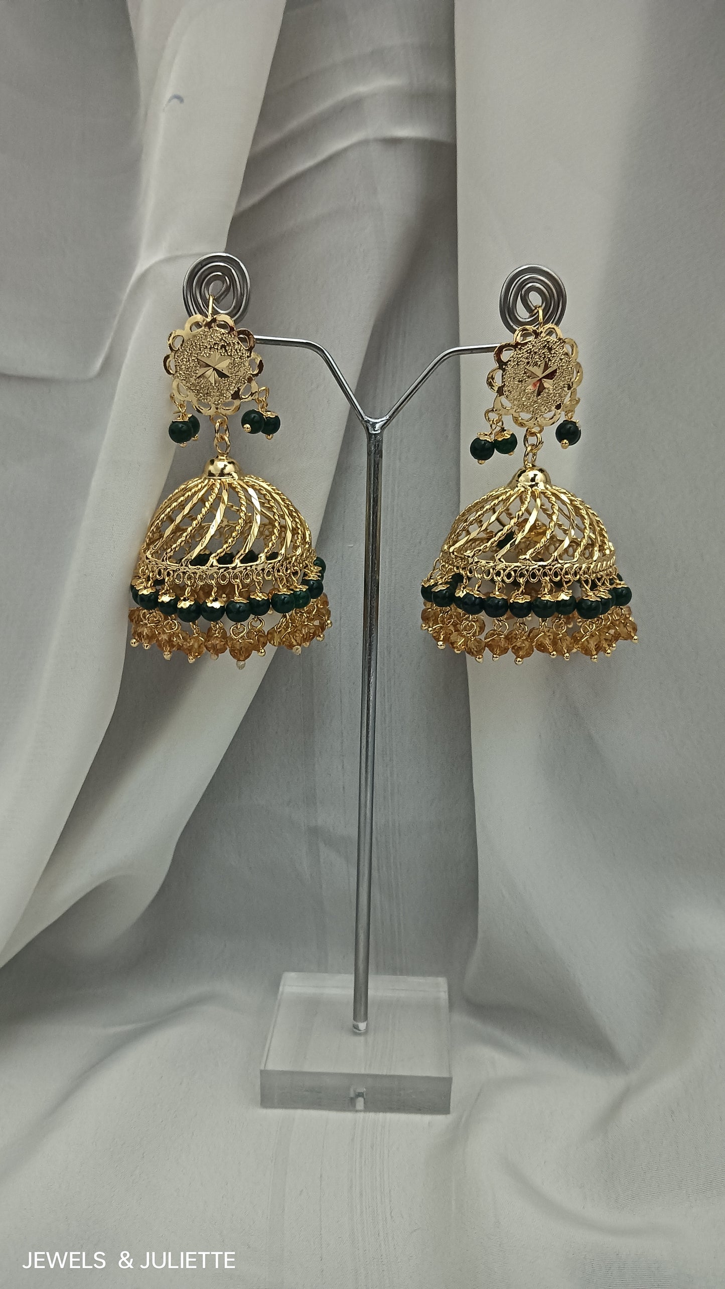 Jhumka earnings