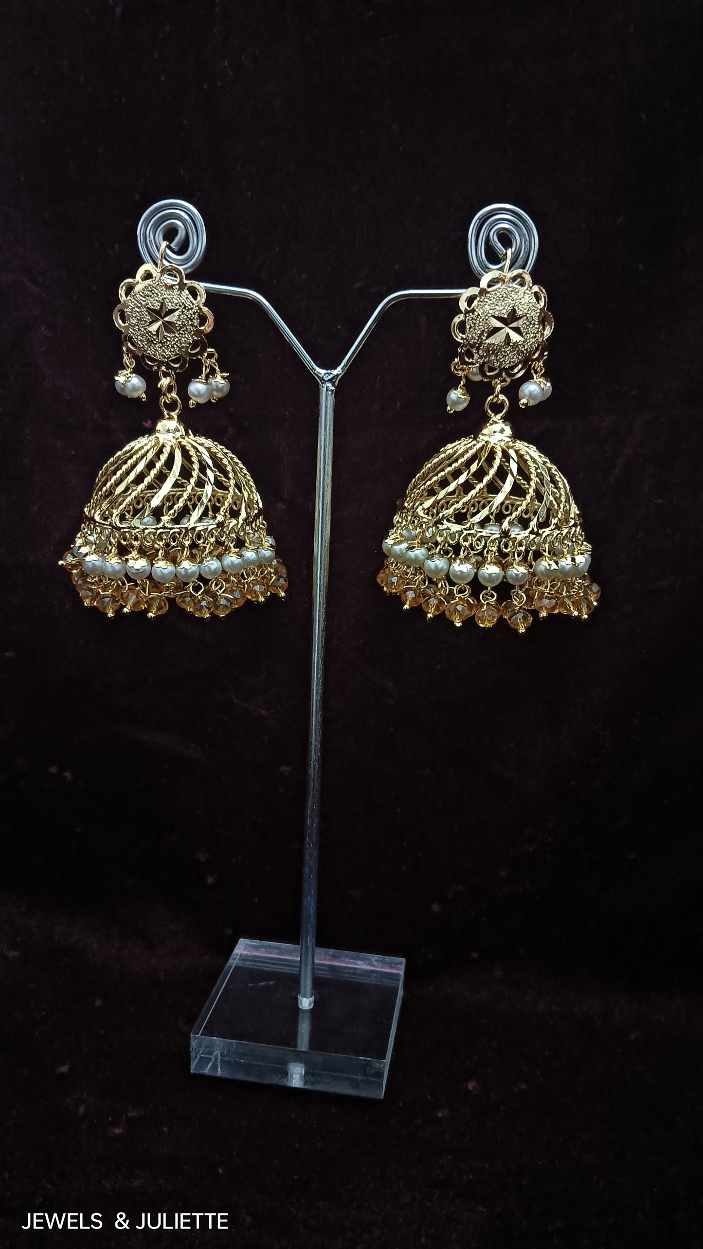 Jhumka earnings